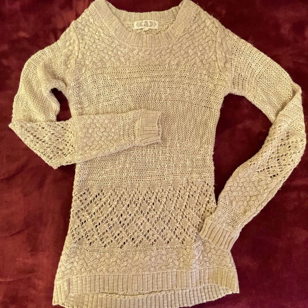Pink Rose multi-pattern knit sweater.